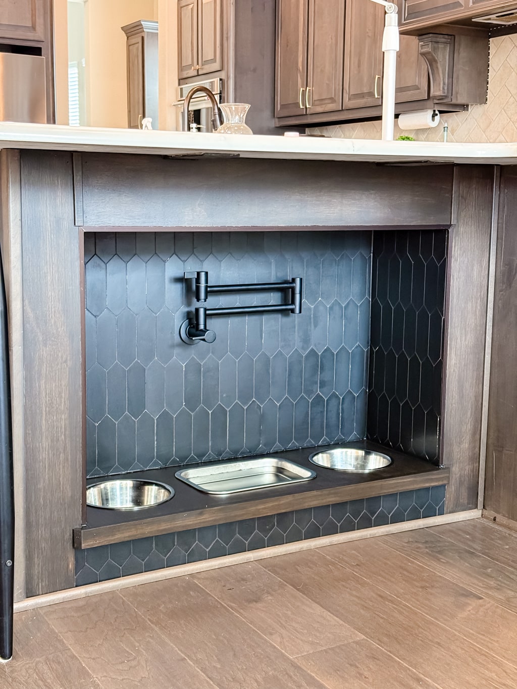 Modern pet feeding station in kitchen