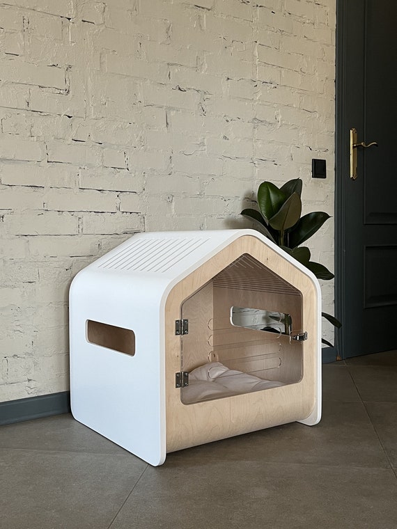 Modern pet crate and bed in living room
